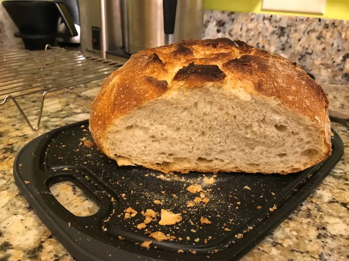 Rustic sourdough bread loaf with a crisp crust and open crumb