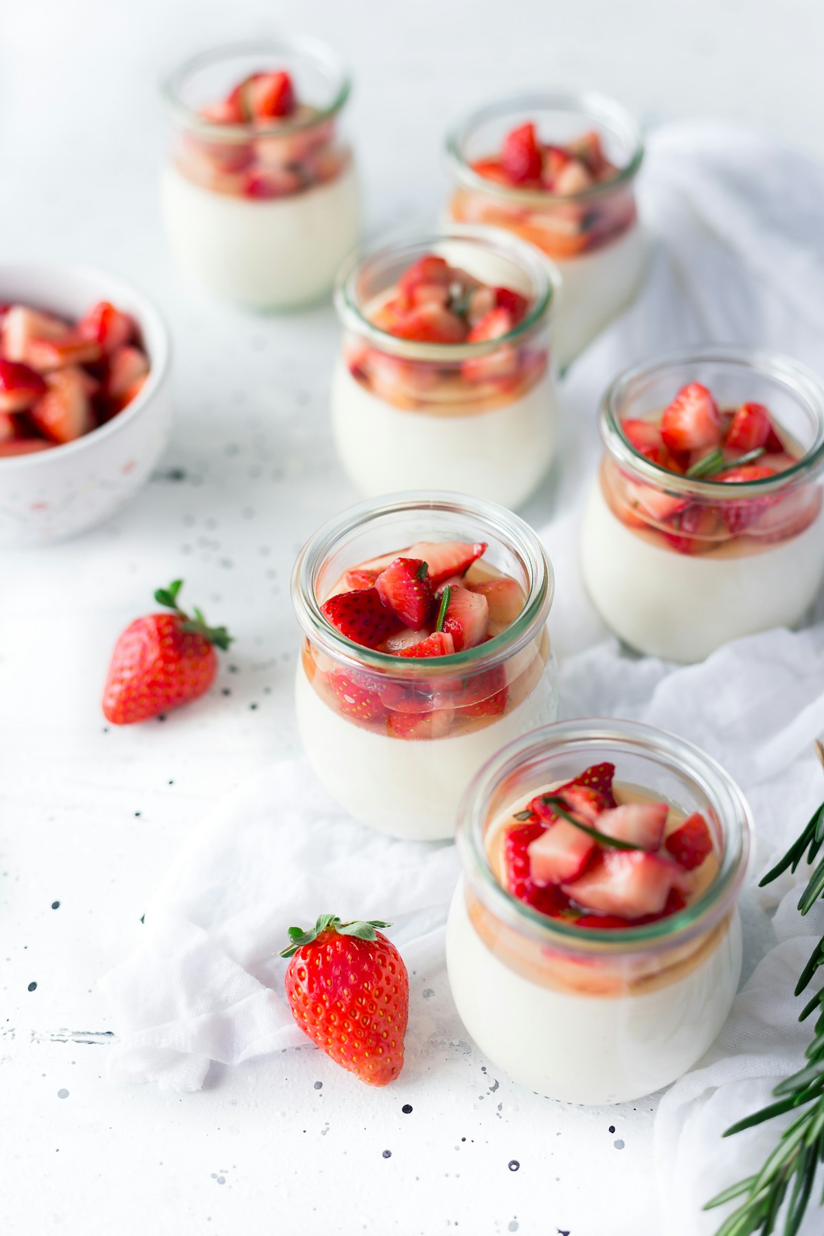 Creamy yogurt in a bowl with honey and fruit