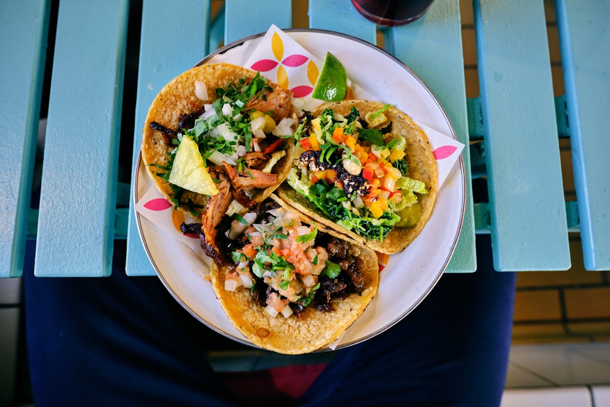 Colorful street tacos with fresh toppings