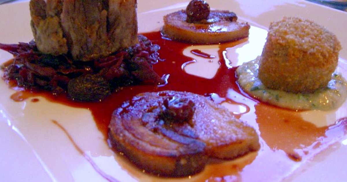 Beef ingredients and finished dish arranged in natural light