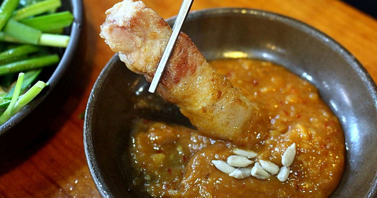 Ssamjang ingredients and finished dish arranged in natural light