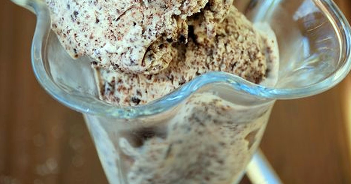 Stracciatella ingredients and finished dish arranged in natural light