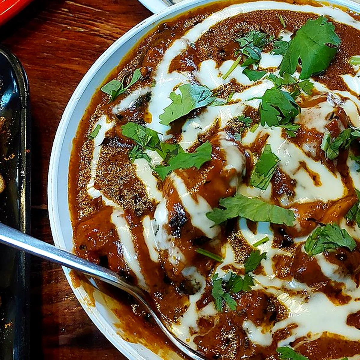 Sauce and Assembly for Butter Chicken, showing the ingredients and preparation at this stage