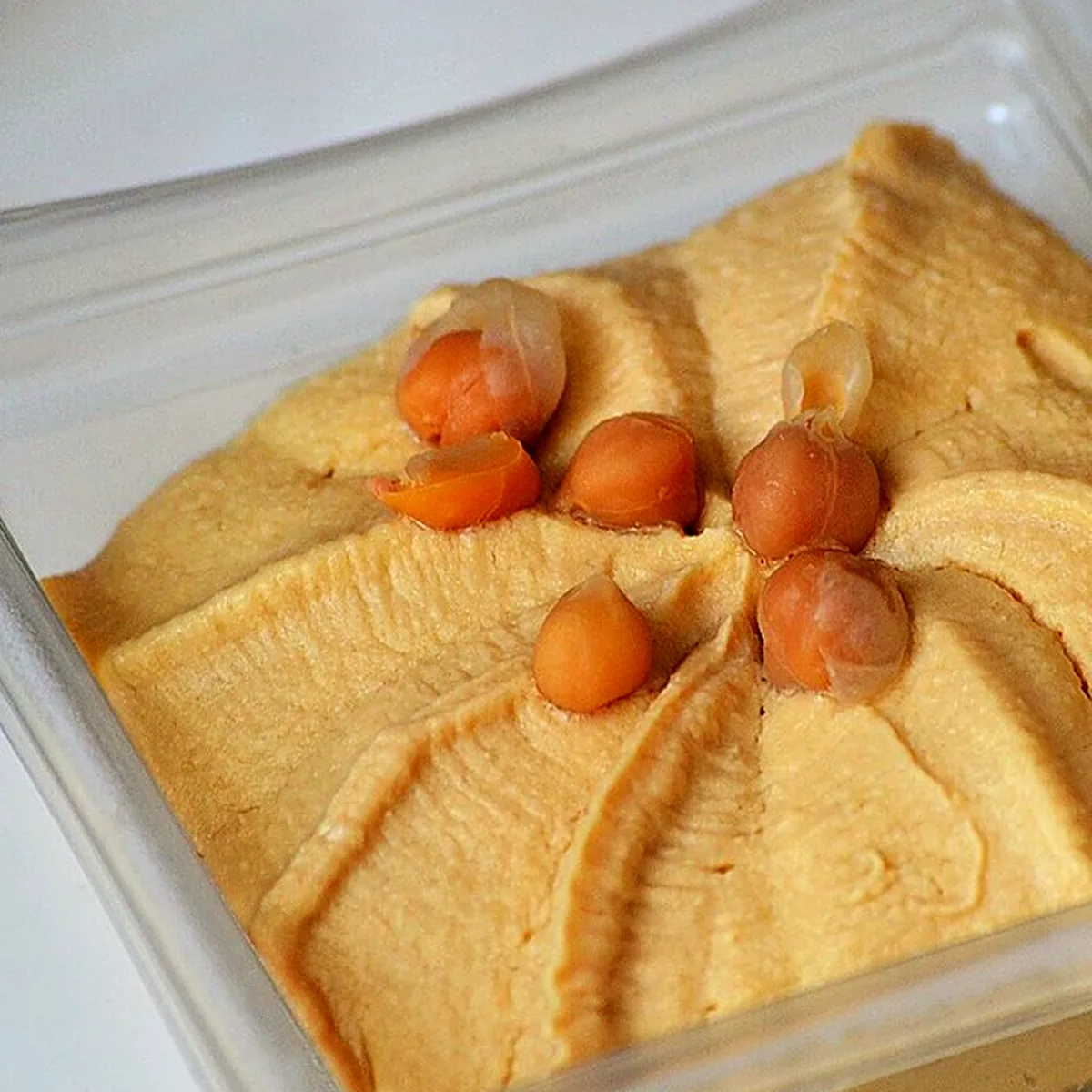 Step 2 for Classic Hummus, showing the ingredients and preparation at this stage
