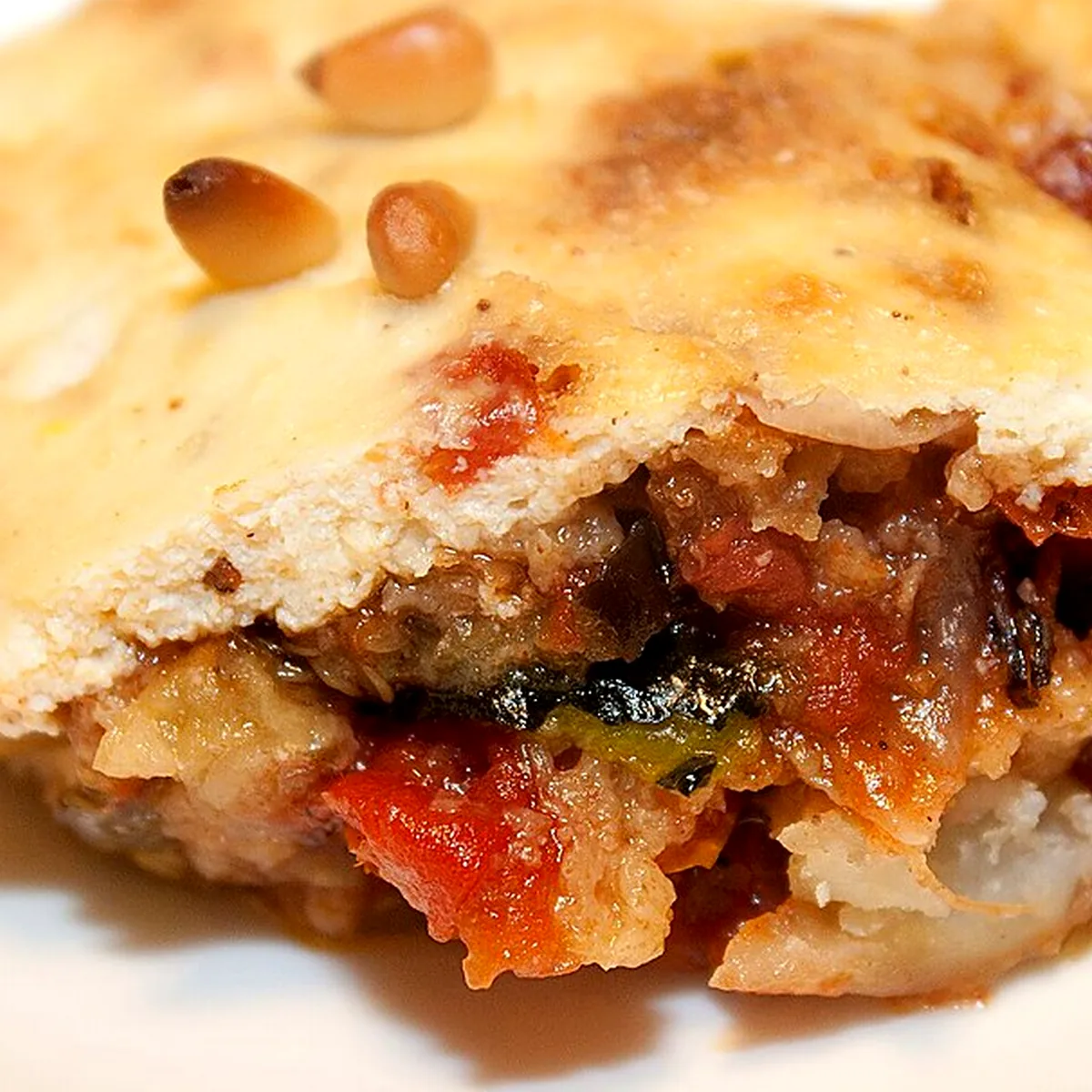 Béchamel and Assembly for Moussaka, showing the ingredients and preparation at this stage