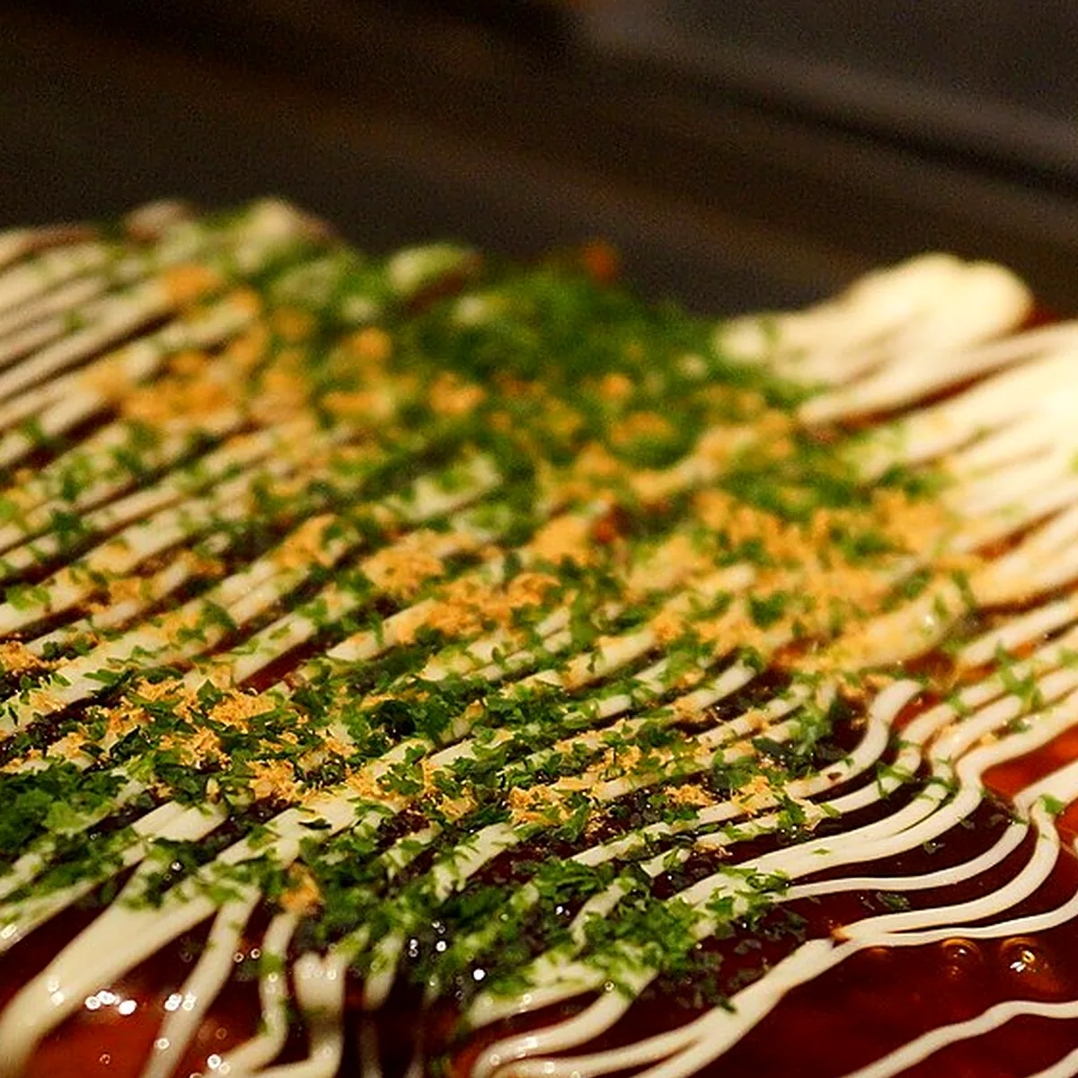 Step 4 for Okonomiyaki, showing the ingredients and preparation at this stage