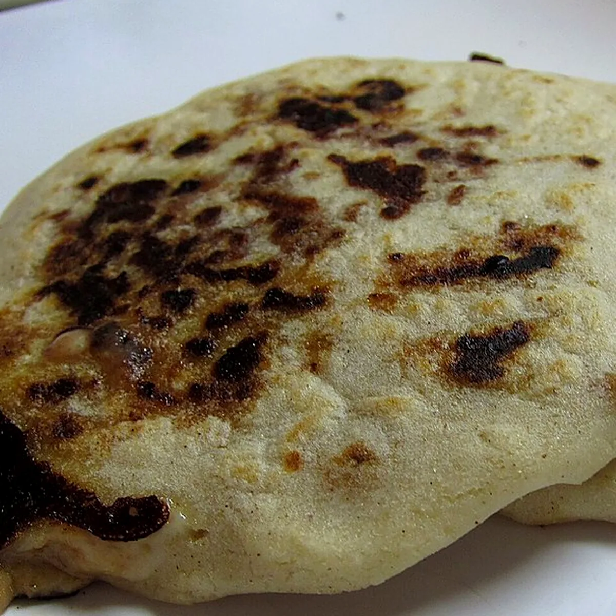 Step 2 for Pupusas, showing the ingredients and preparation at this stage