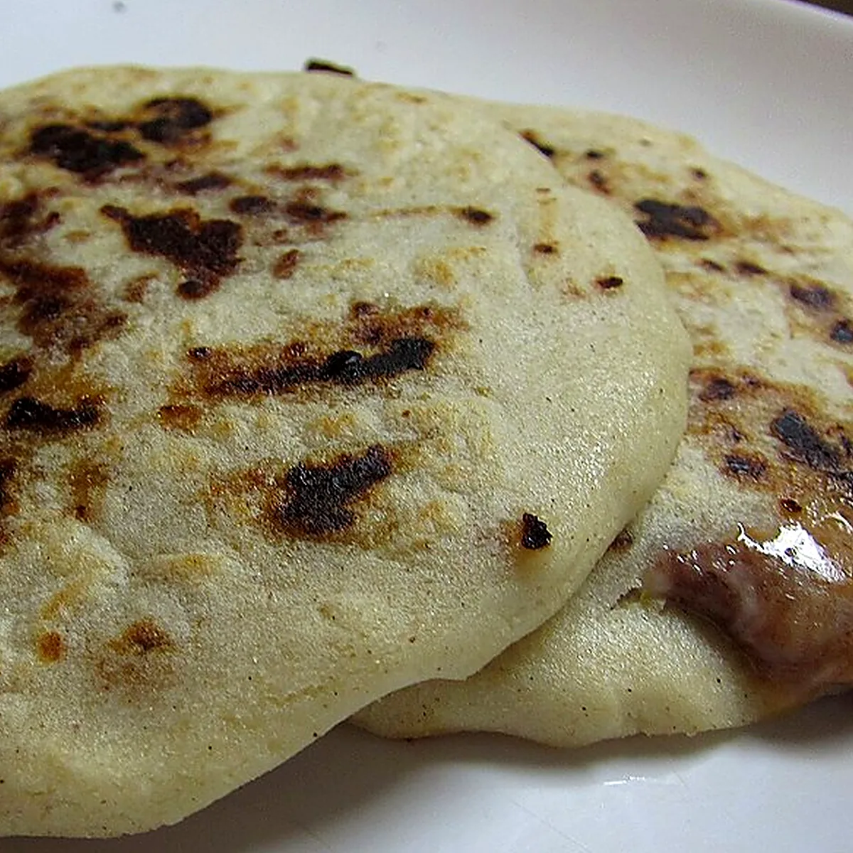 Step 3 for Pupusas, showing the ingredients and preparation at this stage