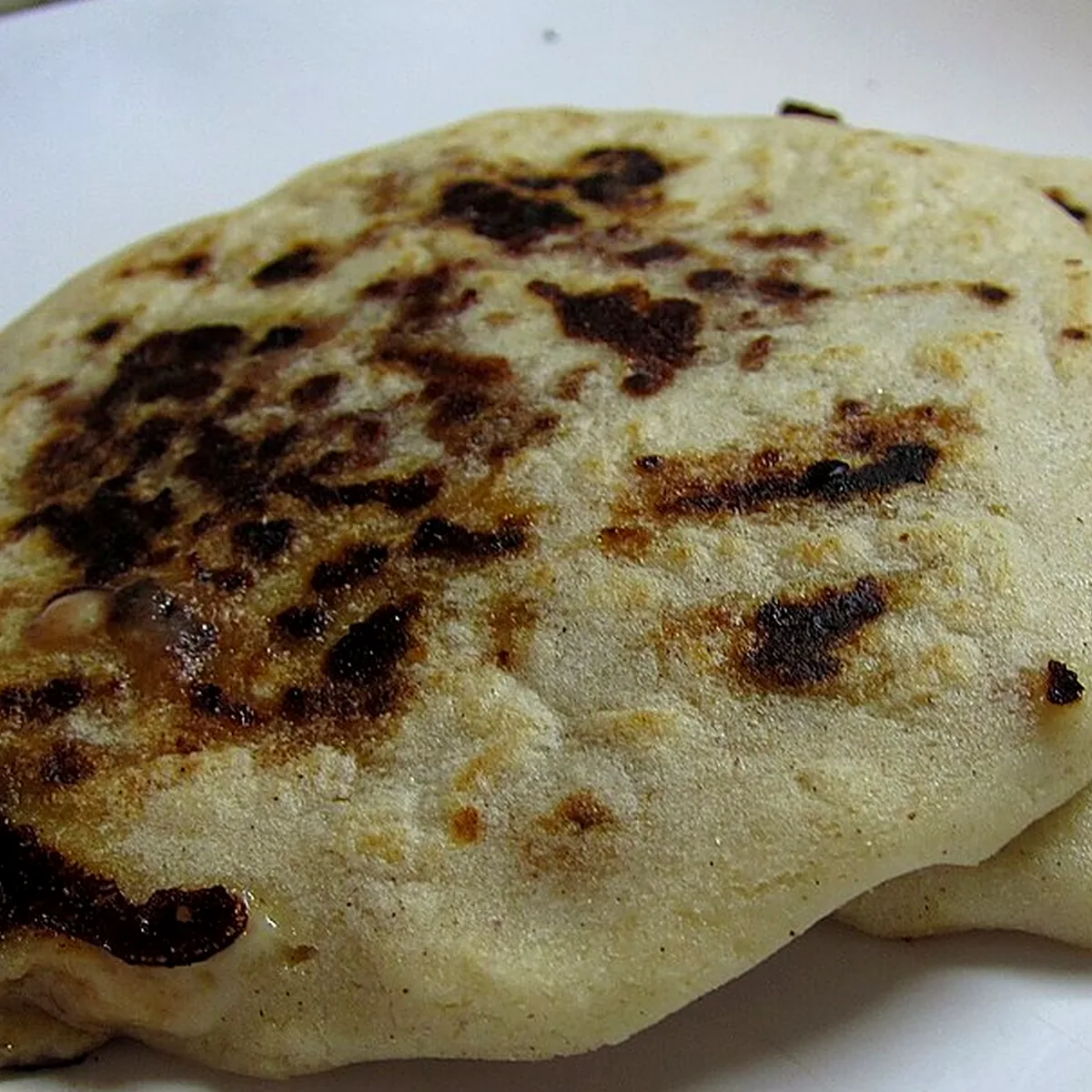 Step 6 for Pupusas, showing the ingredients and preparation at this stage