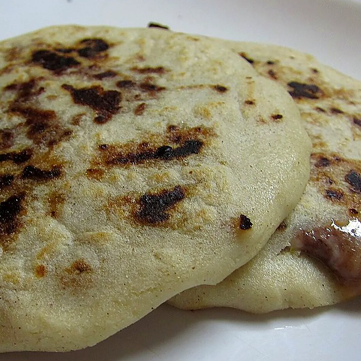 Step 7 for Pupusas, showing the ingredients and preparation at this stage