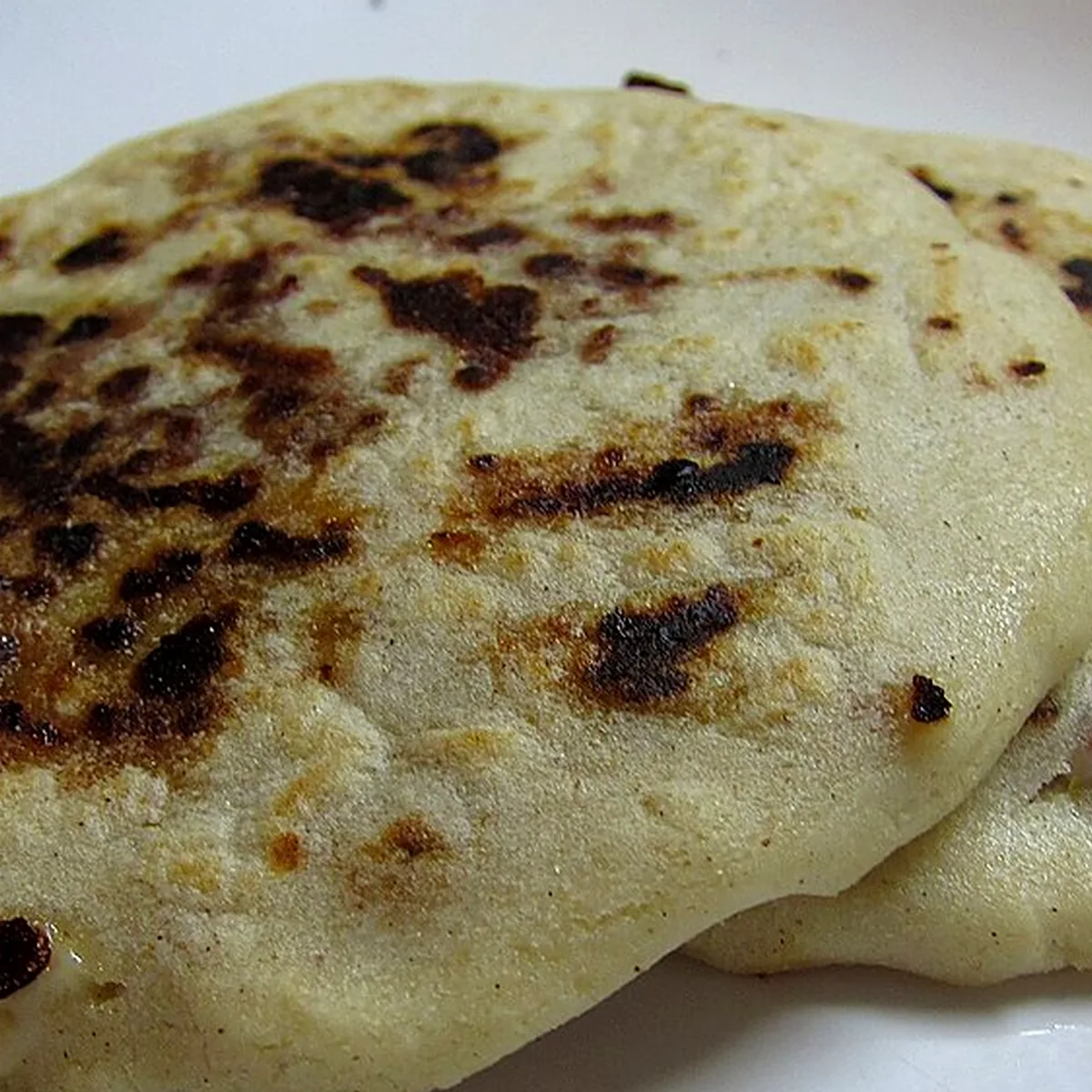 Step 8 for Pupusas, showing the ingredients and preparation at this stage
