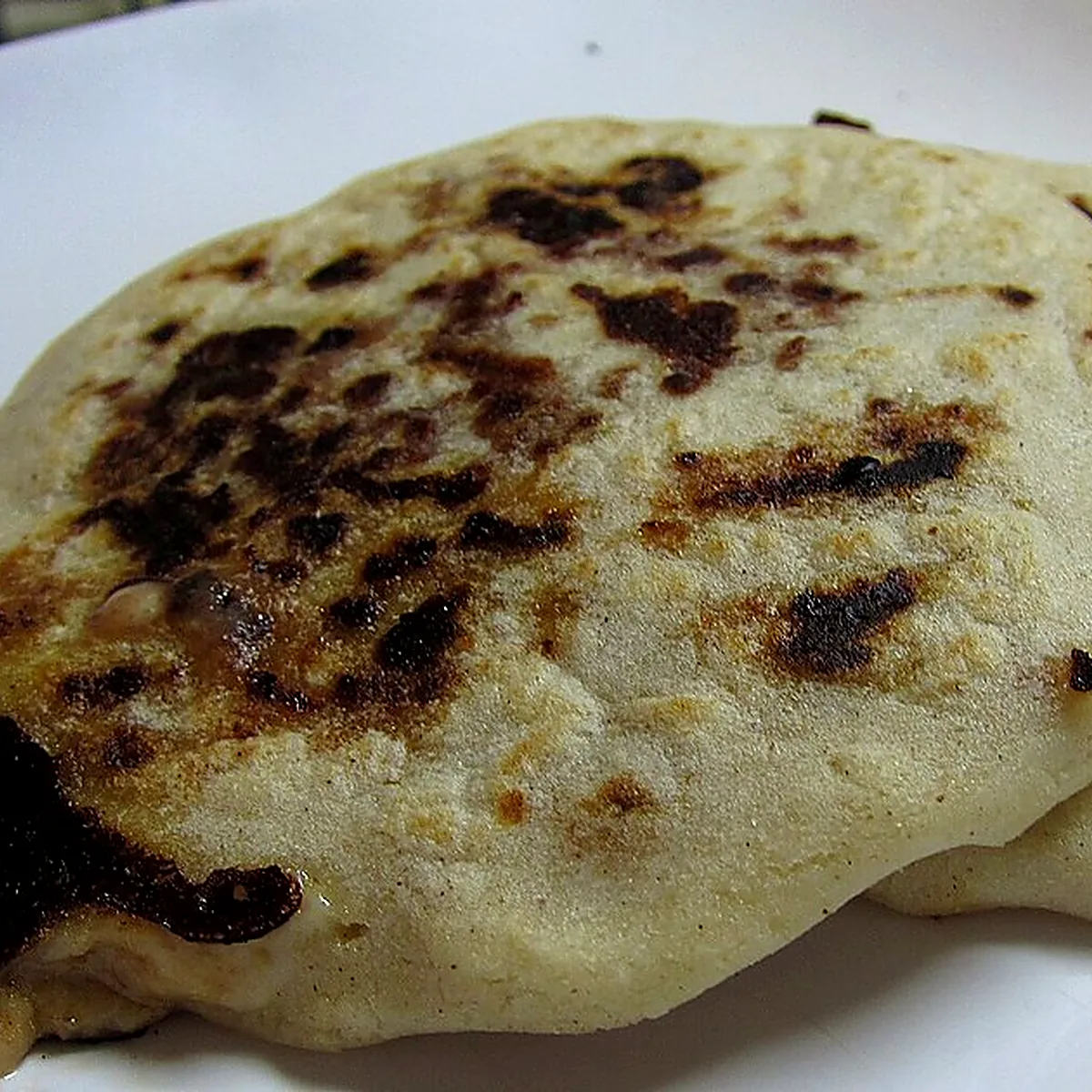 Step 9 for Pupusas, showing the ingredients and preparation at this stage