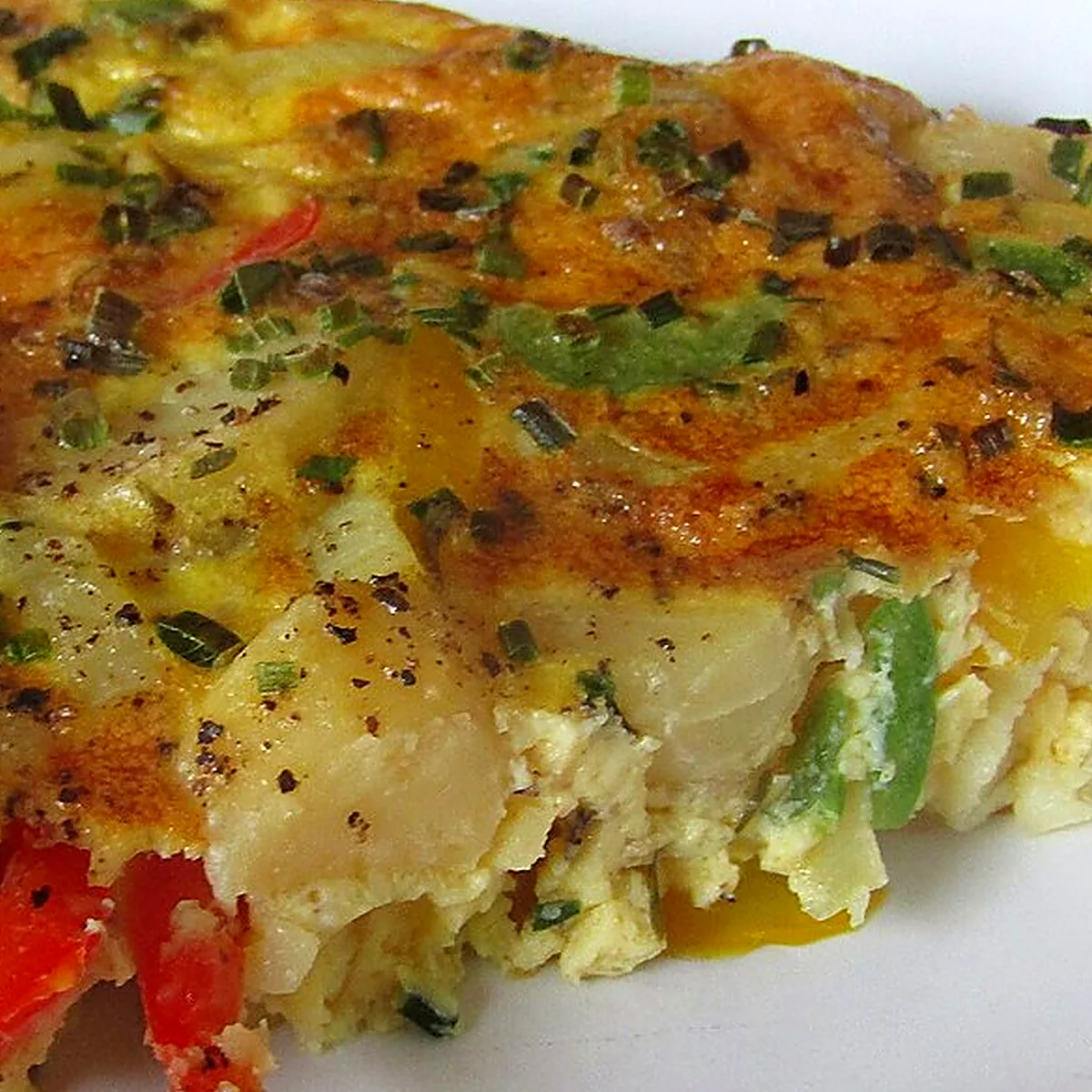 Step 3 for Tortilla Española, showing the ingredients and preparation at this stage