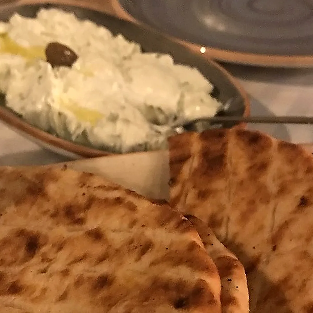 Step 1 for Tzatziki, showing the ingredients and preparation at this stage
